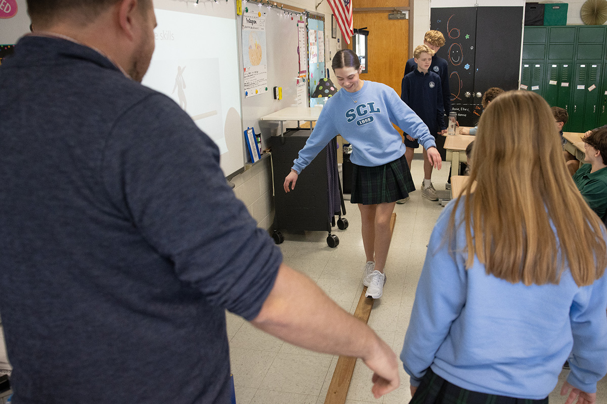 St. Catherine Laboure campus minister engages students in faith and leadership inside and outside the classroom